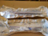 1965 NOS moldings under headlights PAIR